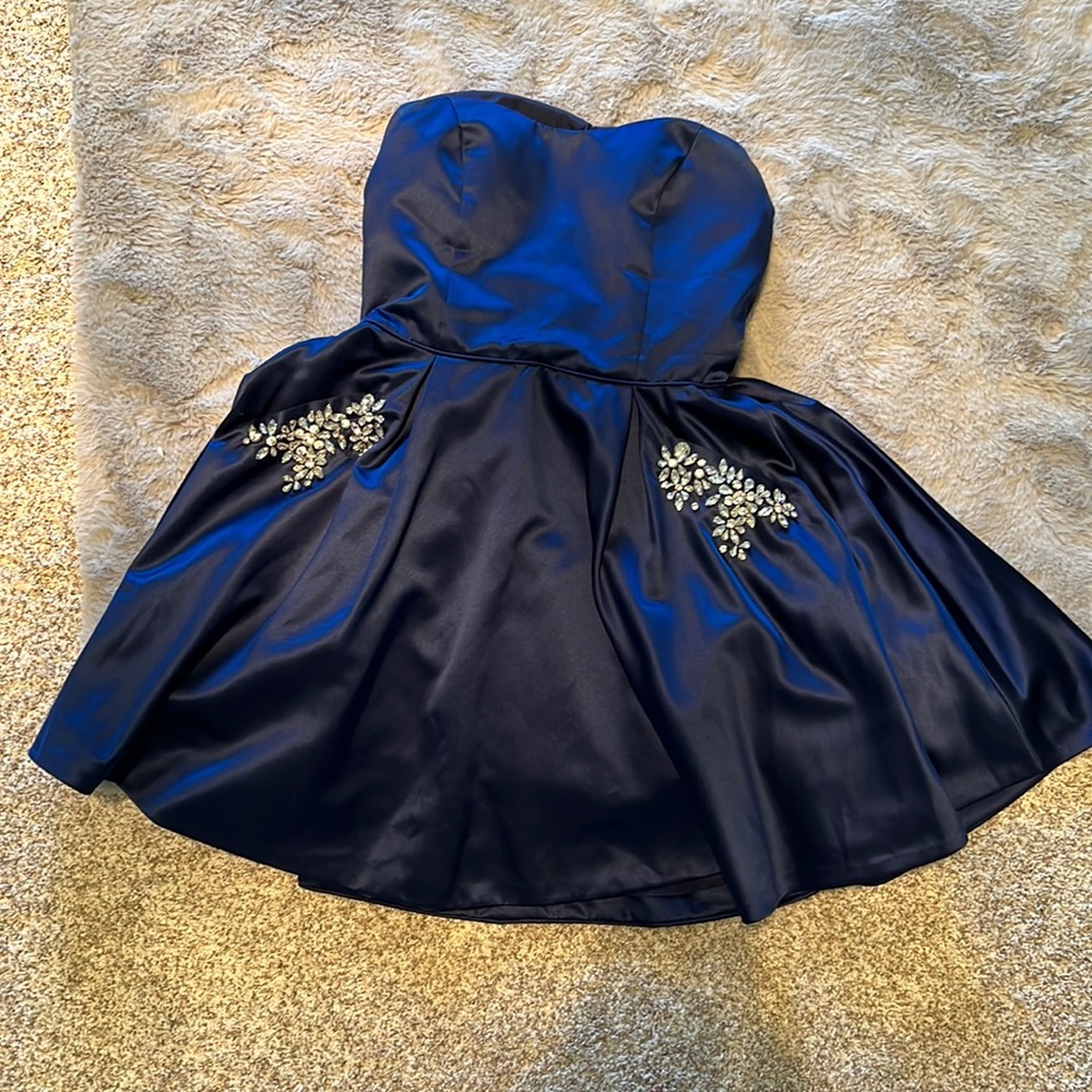 Sherri Hill size 12 Cocktail dress in midnight blue with pockets.